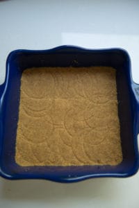 graham cracker crust in a 9 x 9 inch baking dish